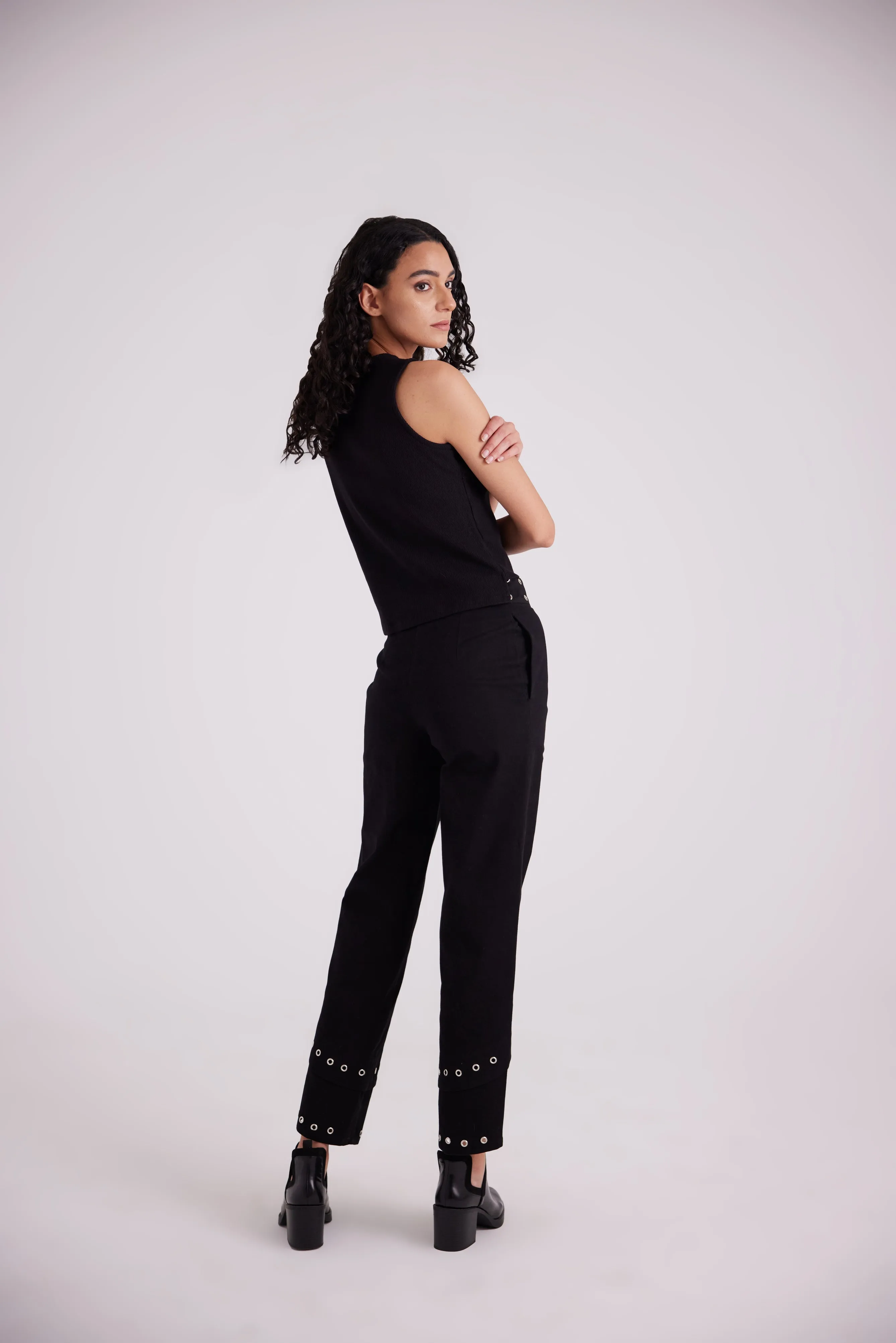 Black asymmetric side buttoned cut top