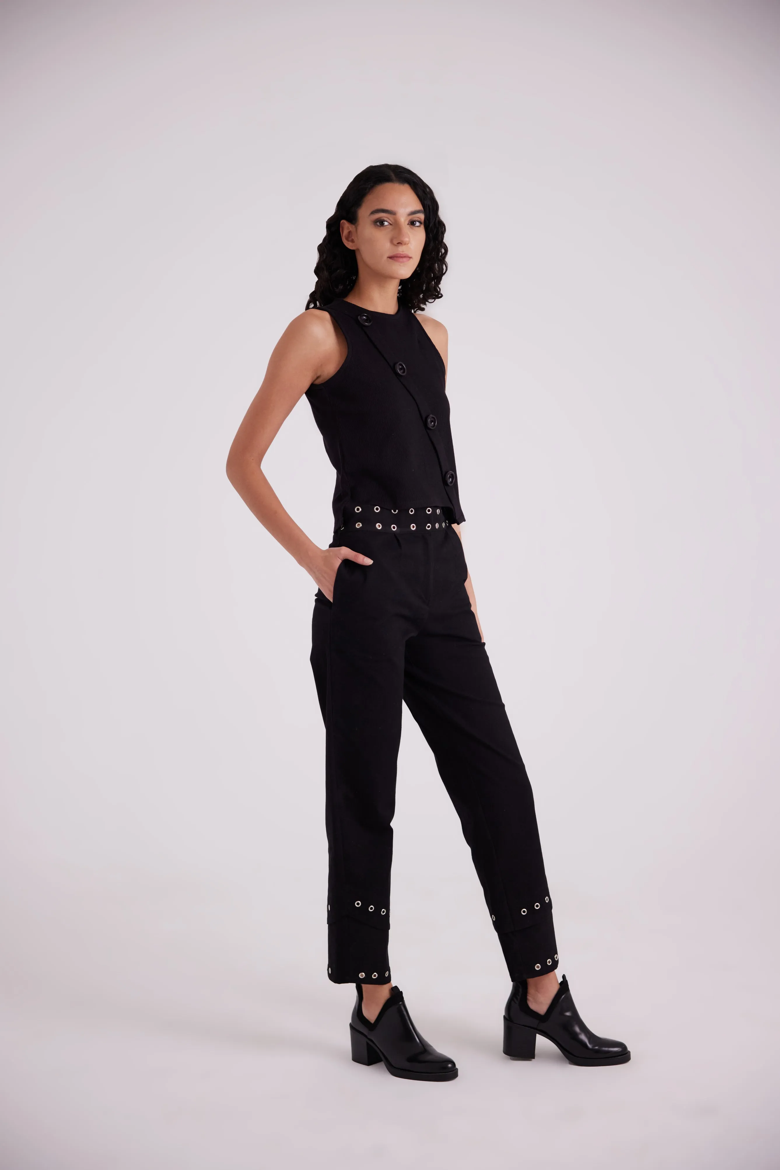 Black asymmetric side buttoned cut top