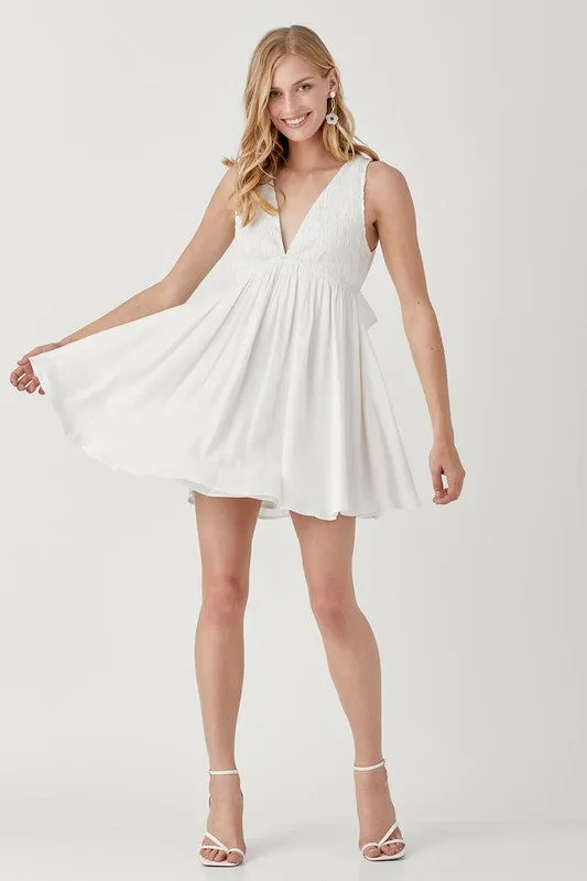 DOLLY V NECK SMOCK SLEEVELESS DRESS