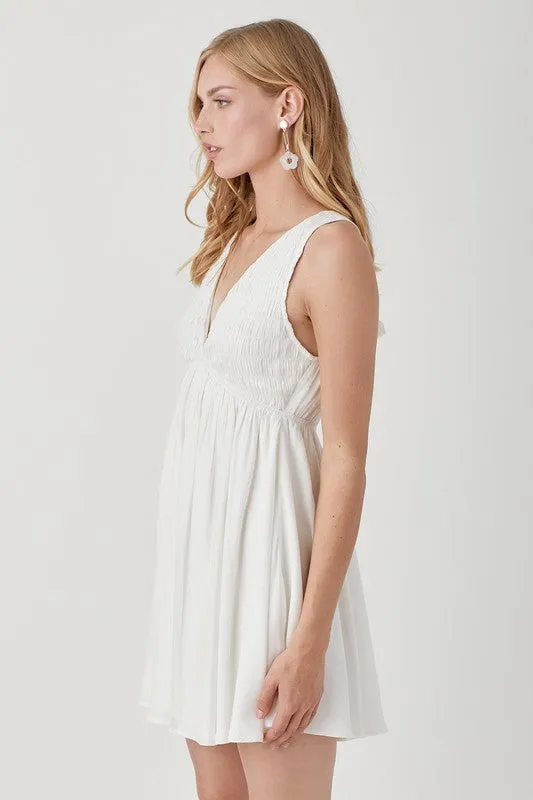 DOLLY V NECK SMOCK SLEEVELESS DRESS