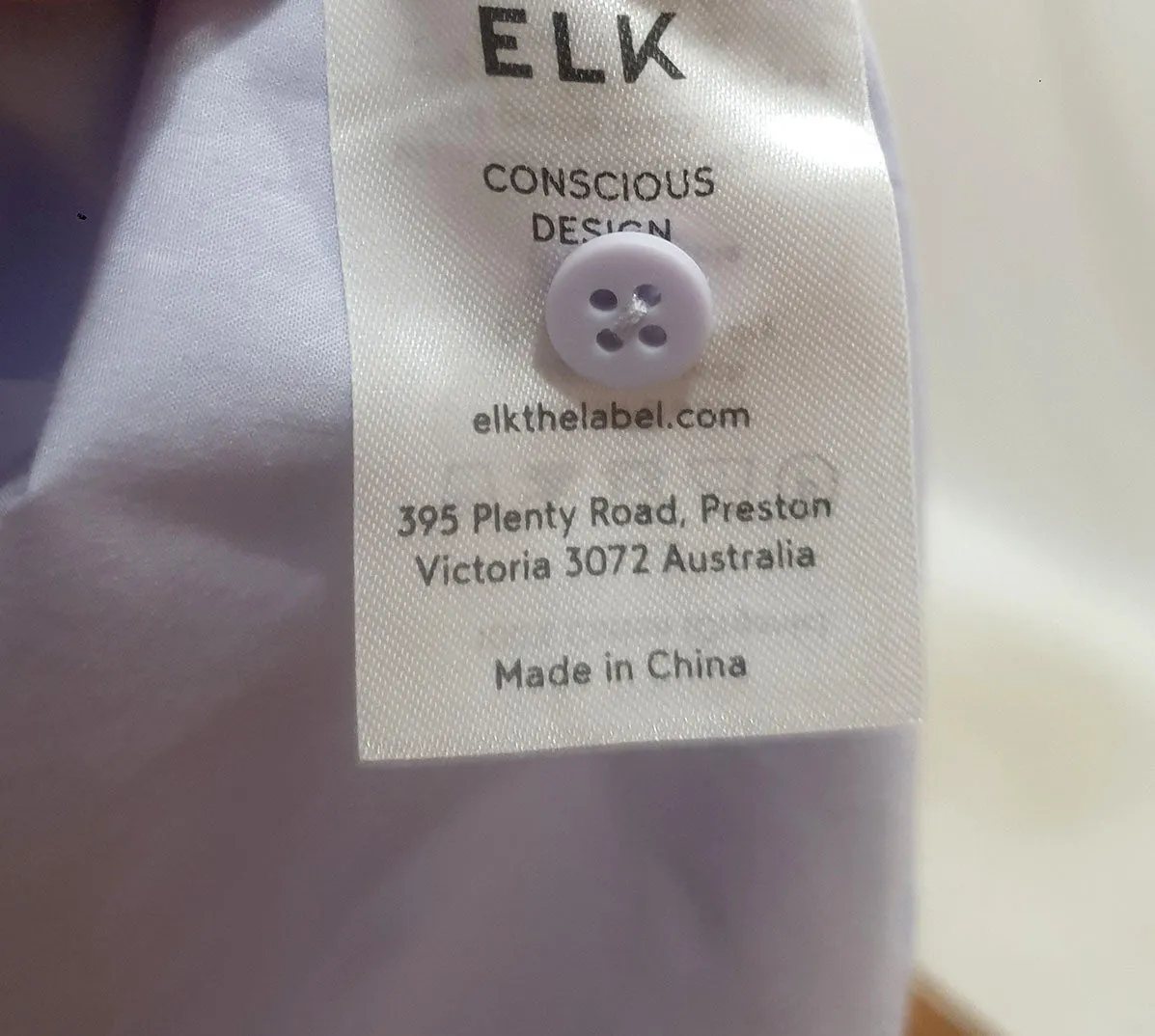 Elk lilac purple asymmetric top size 10