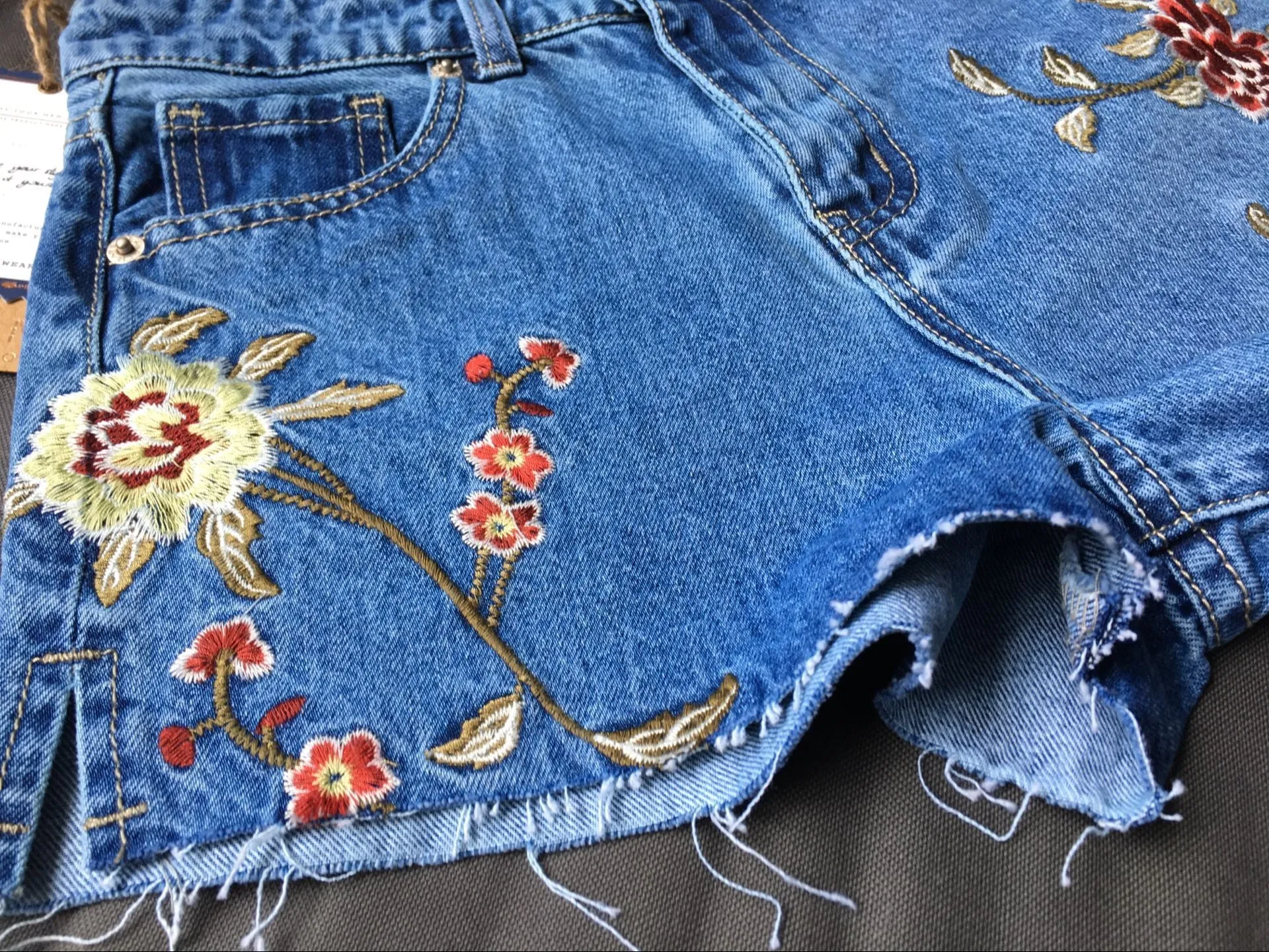 Little Daisy Embroidery Washed Side Slit Denim Shorts