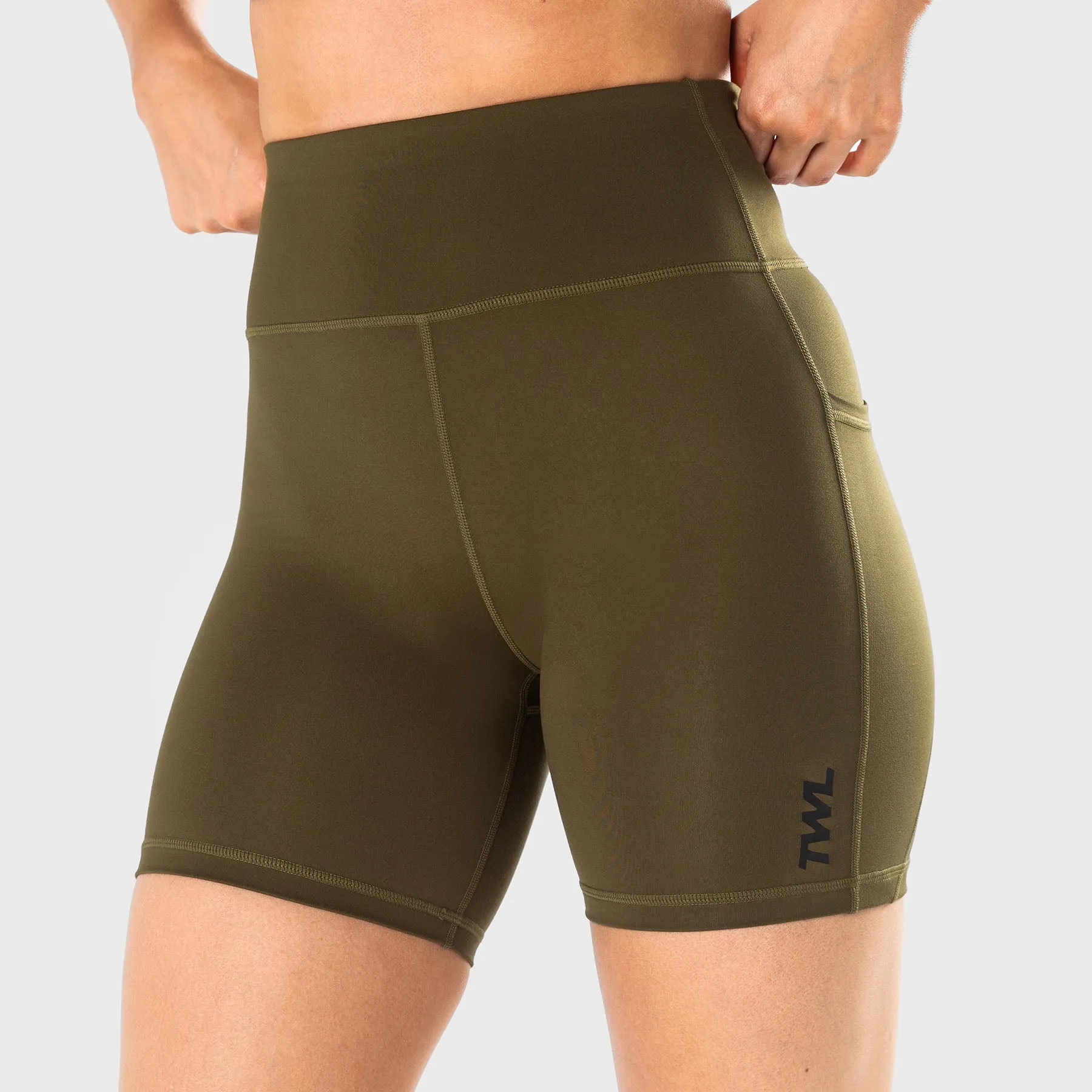 TWL - WOMEN'S ENERGY SHORTS MID LENGTH - UNIFORM GREEN